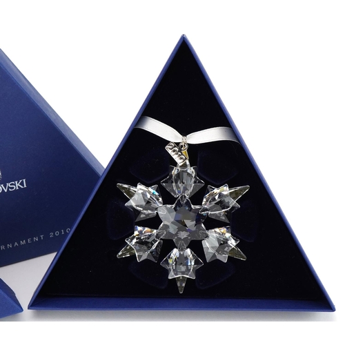 11 - Two Swarovski Crystal Christmas ornaments with boxes comprising dates 2010 and 2011