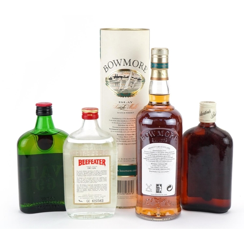 107 - Four bottles of alcohol comprising Bowmore Single Malt whiskey aged 12 years with box, Ballantines w... 