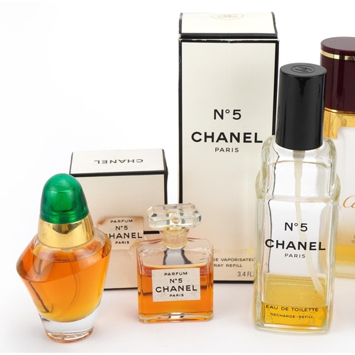 92 - Vintage and later perfume bottles, some with contents including Chanel No 5 and Cartier II Eau de To... 