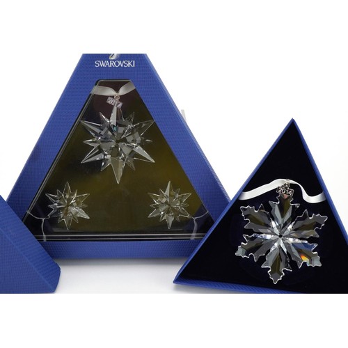 9 - Two Swarovski Crystal Christmas ornaments with boxes comprising dates 2014 and 2017