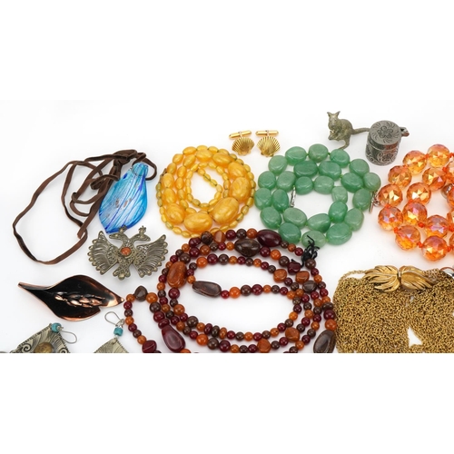 1619 - Vintage and later costume jewellery including a Trifari necklace, amber coloured bead necklaces, bro... 