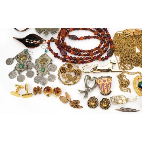 1619 - Vintage and later costume jewellery including a Trifari necklace, amber coloured bead necklaces, bro... 