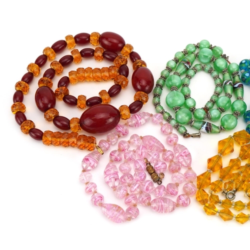 1611 - Five vintage necklaces including Venetian painted glass beads and cherry amber coloured beads