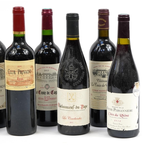 133 - Nine bottles of red wine including Chateau Neuf du Pape, Chateau la Croix de Grezard Saint Emilion, ... 