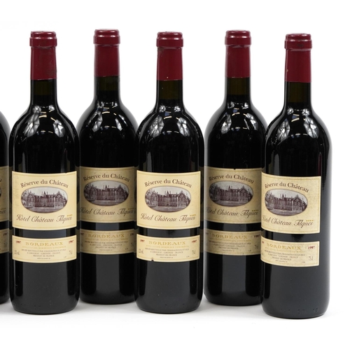 119 - Eight bottles of 1997 Reserve du Chateau Hotel Chateau Tilques red wine