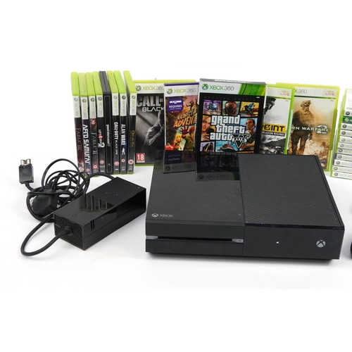 340 - Xbox games console with two controllers and a collection of Xbox 360 games