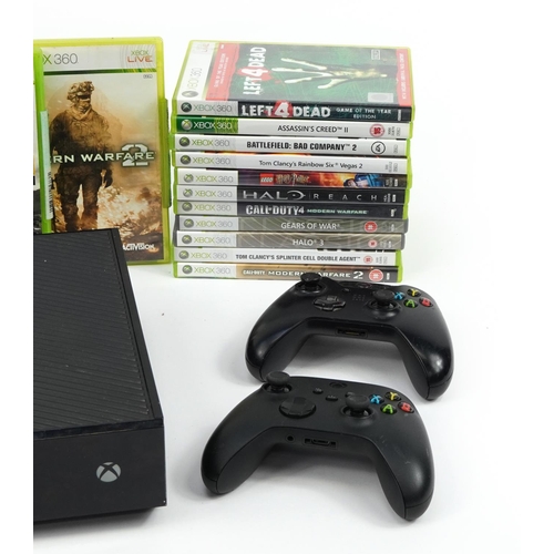 340 - Xbox games console with two controllers and a collection of Xbox 360 games