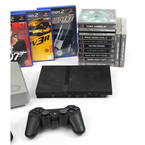 342 - PlayStation 1 and PlayStation 2 Slimline games consoles with controllers and a collection of games