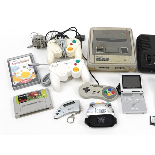 339 - Vintage and later games consoles and hand held games consoles including Super Nintendo, Sega Mega Dr... 