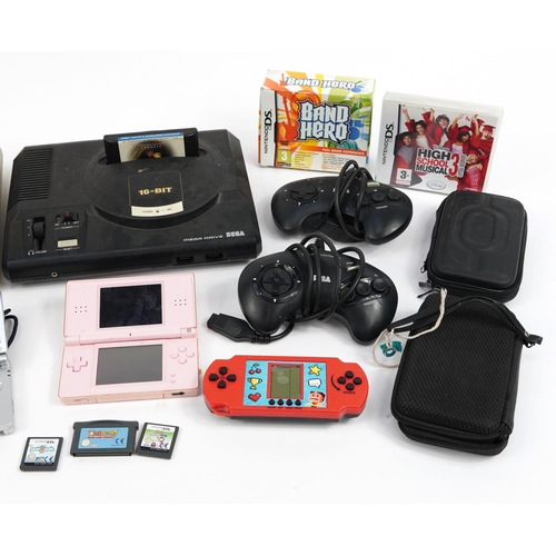339 - Vintage and later games consoles and hand held games consoles including Super Nintendo, Sega Mega Dr... 