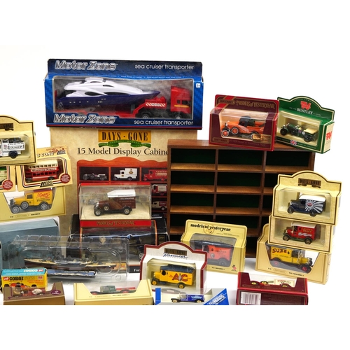 320 - Collection of diecast advertising collector's vehicles and boats with boxes including Days Gone, Mai... 