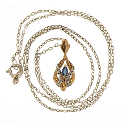 1502 - 9ct gold sapphire and diamond crossover drop pendant on a silver necklace, 2.2cm high and 50cm in le... 