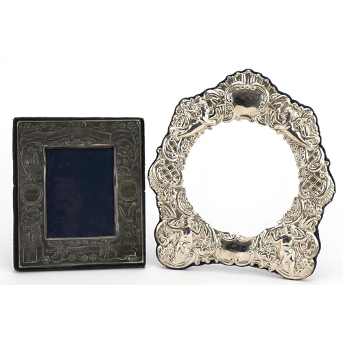 162 - Two silver mounted photo frames comprising one christening photo frame and one other embossed with P... 