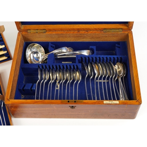 59 - Racine oak canteen of silver plated cutlery, the knives and carving set with ivorine handles, the ca... 