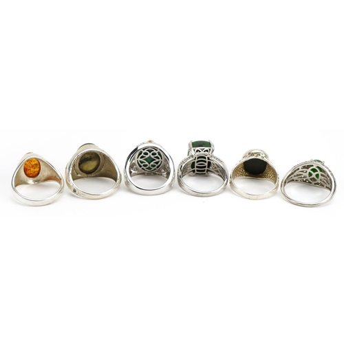 1498 - Six silver semi precious stone rings including malachite, bloodstone and amber, various sizes, 47.8g