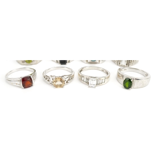 1535 - Eight silver semi precious stone rings including peridot, citrine and cubic zirconia, various sizes,... 