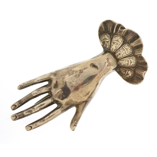 1542 - Unmarked silver brooch in the form of a female's hand, 6cm wide, 9.5g