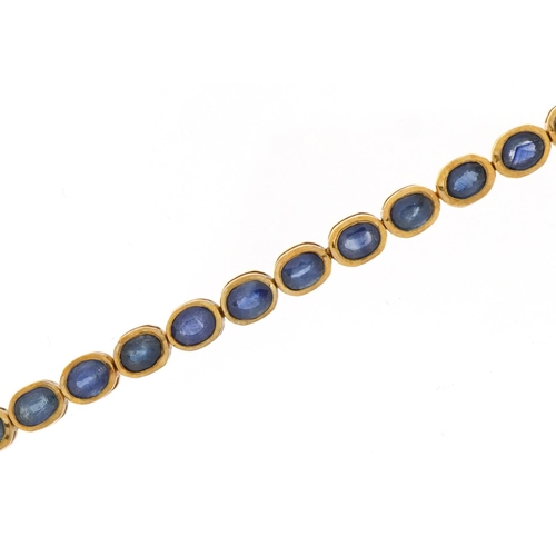 1071 - 9ct gold sapphire line bracelet, 20cm in length, 10.3g