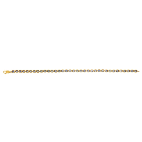 1071 - 9ct gold sapphire line bracelet, 20cm in length, 10.3g