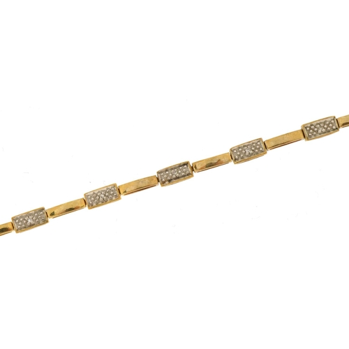 1085 - 9ct gold bracelet set with diamonds, 19cm in length, 5.9g