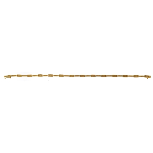 1085 - 9ct gold bracelet set with diamonds, 19cm in length, 5.9g