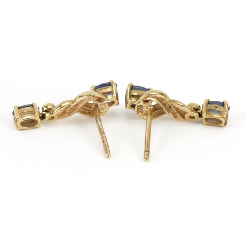 1074 - Pair of 9ct gold sapphire and diamond crossover drop earrings, 1.9cm high, 2.4g