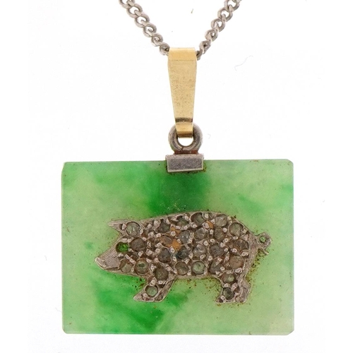 1543 - Chinese green jade pig zodiac sign pendant set with diamonds on a 9ct white gold curb link necklace,... 