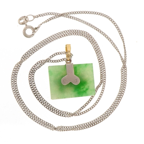 1543 - Chinese green jade pig zodiac sign pendant set with diamonds on a 9ct white gold curb link necklace,... 