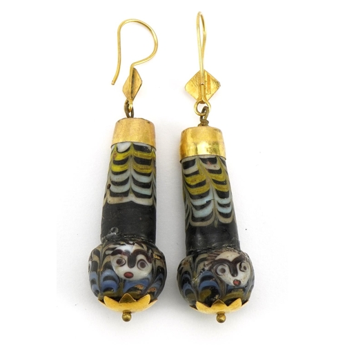 1328 - Pair of unmarked gold Islamic glass bead drop earrings, 6cm high, 15.6g