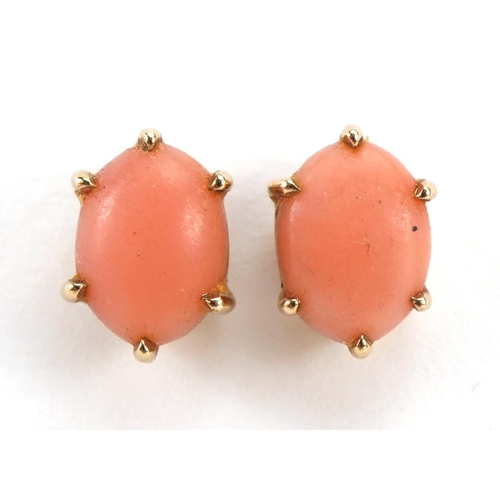 1157 - Pair of 9ct gold cabochon coral stud earrings, 9mm high, 1.9g