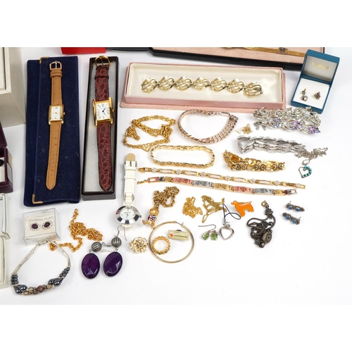1628 - Vintage and later jewellery and wristwatches, some silver including rings, earrings, brooches, neckl... 