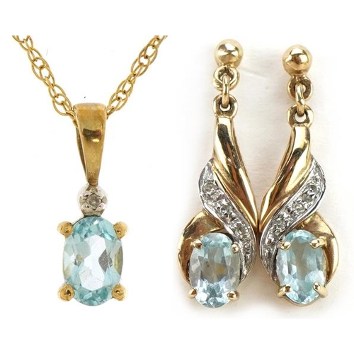 1545 - 9ct gold blue stone and diamond pendant on a 9ct gold necklace with matching earrings, the pendant 1... 