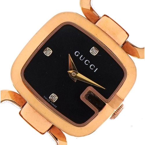 1559 - Gucci, ladies Gucci Dial G wristwatch numbered 125.5 with spare link and box, the case 24mm wide