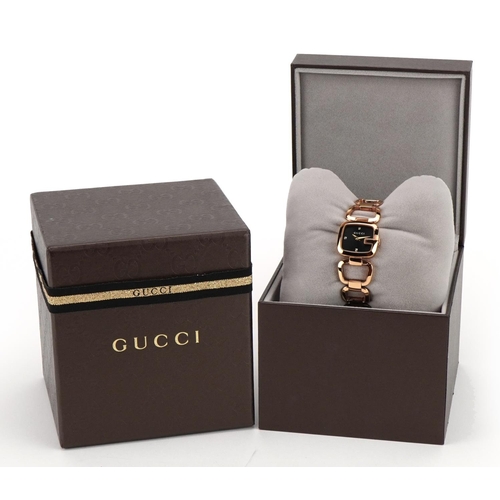 1559 - Gucci, ladies Gucci Dial G wristwatch numbered 125.5 with spare link and box, the case 24mm wide