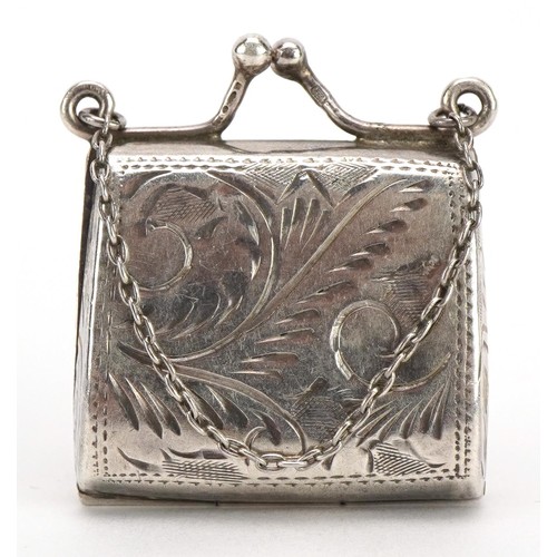 188 - Silver pillbox in the form of a purse with engraved decoration, 3cm high, 10.4g