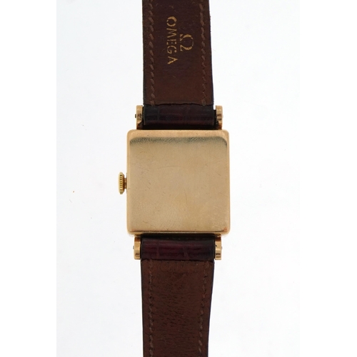 1105A - International Watch Co, gentlemen's 9ct gold wristwatch with Omega brown leather strap, the dial mar... 