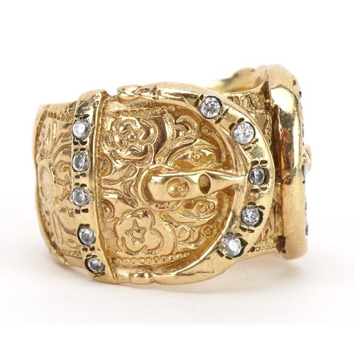 1018A - Heavy gentlemen's 9ct gold double buckle ring set with clear stones, size U, 25.0g