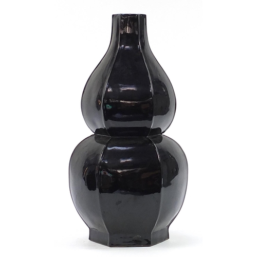 380 - Large Chinese porcelain hexagonal double gourd vase having a black glaze, 64cm high