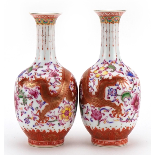 263 - Pair of Chinese porcelain vases hand painted in the famille rose palette and iron red with dragons c... 