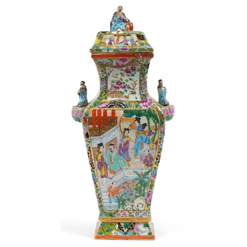 21 - Chinese Canton porcelain vase and cover with twin handles, finely hand painted in the famille rose p... 