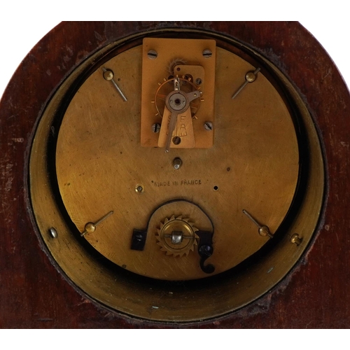 215 - Edwardian mahogany dome top mantle clock, the dial having Arabic numerals, 22cm high