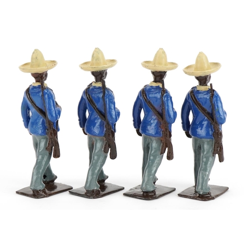 1457 - Four vintage Britains hand painted lead African soldiers, 6.5cm high