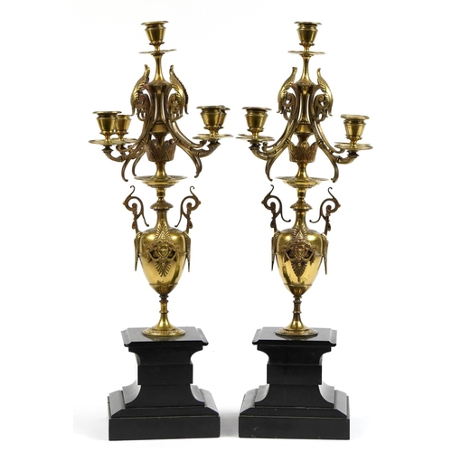 223 - Pair of 19th century bronzed five branch candelabras raised of black slate bases, each 62cm high