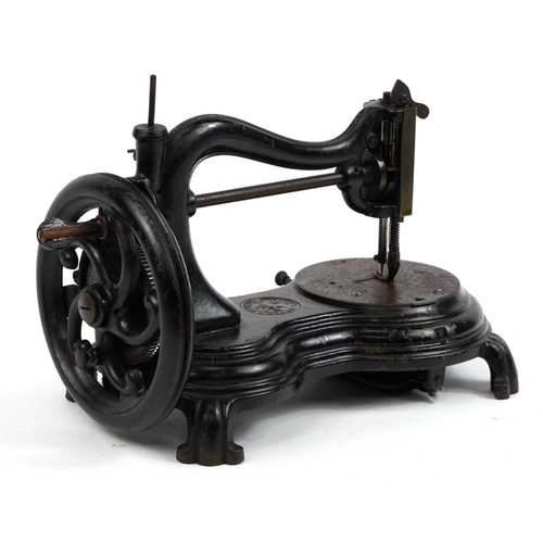 432 - Victorian Jones black enamel cast iron hand sewing machine, 37cm in length