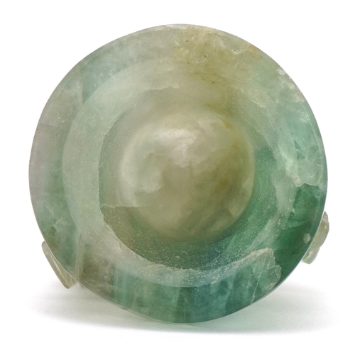 389 - Chinese fluorite carving of an Archaic style bell with foo dog knop, 7cm high