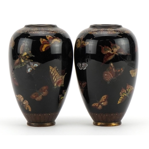 65 - Pair of Japanese cloisonne vases enamelled with butterflies, 11.5cm high