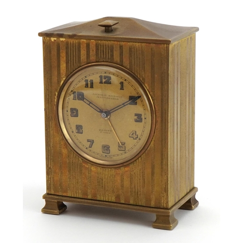 219 - Zenith, Art Deco brass cased travel alarm clock with velvet lined case, the clock retailed by Arnold... 