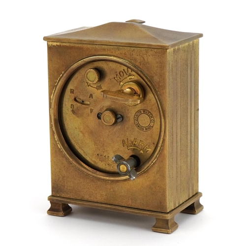 219 - Zenith, Art Deco brass cased travel alarm clock with velvet lined case, the clock retailed by Arnold... 