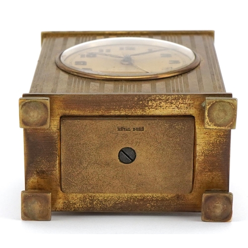 219 - Zenith, Art Deco brass cased travel alarm clock with velvet lined case, the clock retailed by Arnold... 