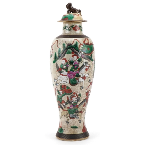 515 - Chinese crackle glaze baluster shaped vase and cover hand painted in the famille verte palette with ... 